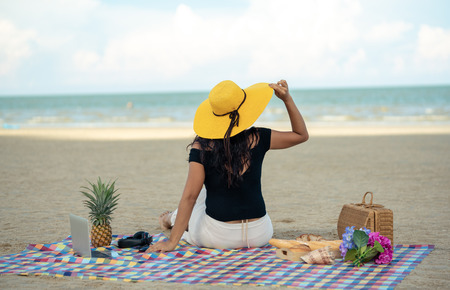 Young woman relaxing on the beachの写真素材