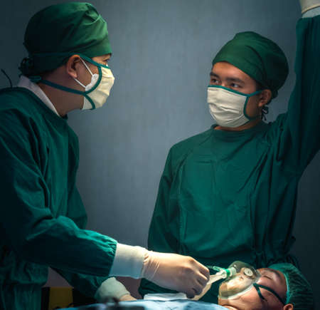 Team of Doctor save the patient's life and surgeons in operation theatreの写真素材