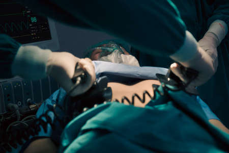 Team of Doctor save the patient's life and surgeons in operation theatreの写真素材