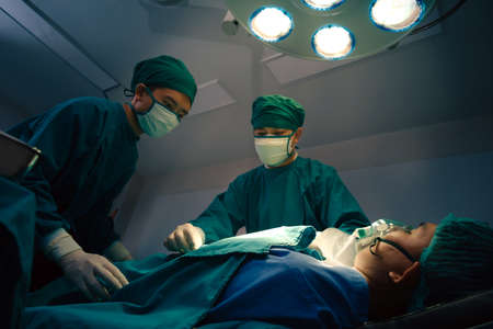 Team of Doctor save the patient's life and surgeons in operation theatreの写真素材