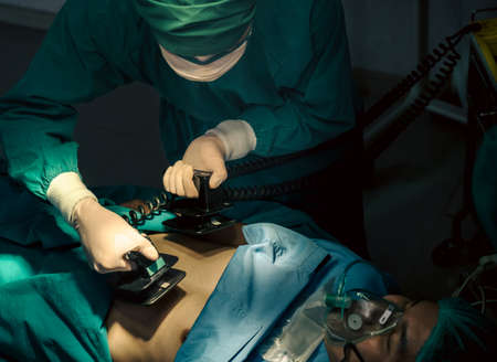 Team of Doctor save the patient's life and surgeons in operation theatreの写真素材