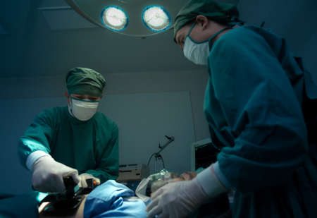Team of Doctor save the patient's life and surgeons in operation theatreの写真素材