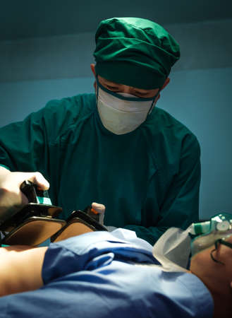 Team of Doctor save the patient's life and surgeons in operation theatreの写真素材