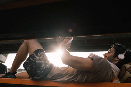 Young causian basketball player resting and ralax.の写真素材