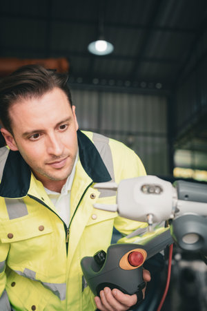 Engineer training with new robotics machine in Factoryの写真素材