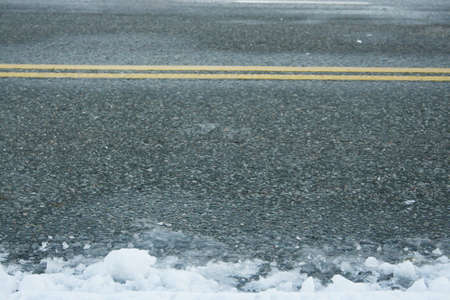 winter road with ice and snowの写真素材