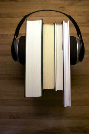 Headset and printed books illustrating audiobooksの写真素材