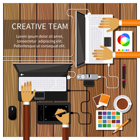 Team of designers working together on a computer. Creative team. flat design styleのイラスト素材