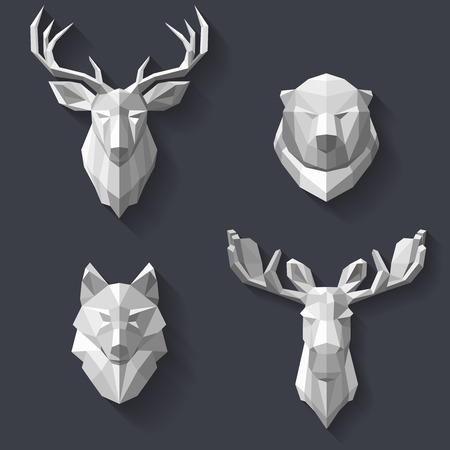 The heads of the forest animals are hanging on the wall. Head of white polygons. Abstract animals. The hunting trophies in the polygonal style. illustrationのイラスト素材
