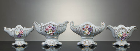 Antique porcelain tableware , Ceramic tableware , Vintage porcelain plate on a gray background with a reflectionの写真素材