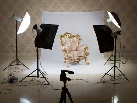 photo studio take shot furniture photography , Interior photo studio with lighting equipment and armchair in the roomの写真素材