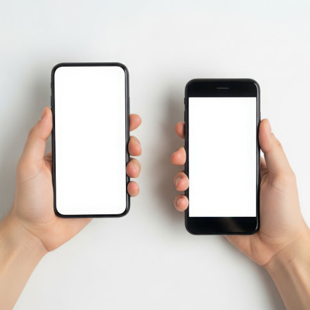 The image features two smartphones held side by side against a white background. The screens of both smartphones are blank. The image is on a transparent background, making it suitable for various digital applications. This SEO-friendly description highlights the key elements of the image.の素材