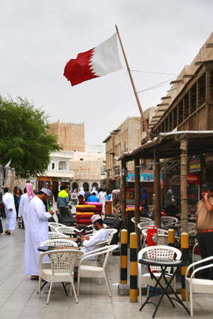 Doha ,Qatar  November 15 ,2018 : Many people walking at Souq Waqif is a marketplace in Doha of Qatar.のeditorial素材