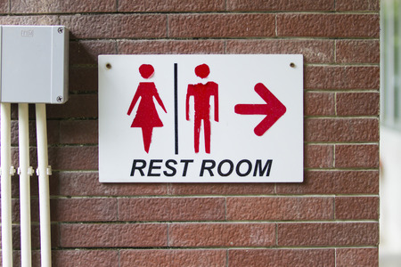 Restroom sign on the wallの写真素材