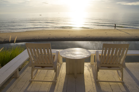 Rocking Chair at the terrace, Sunriseの写真素材