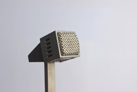retro microphone isolated on white. Public speaking. Talking to audience.の写真素材