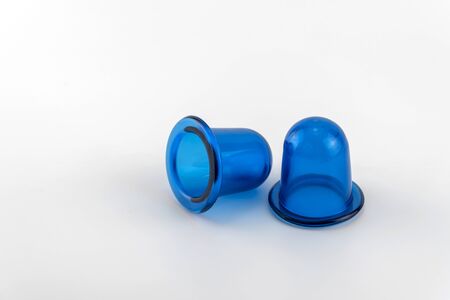 blue anti cellulite vacuum silicone banks for body on white background. a tool for home massage and Wellness procedures.の写真素材