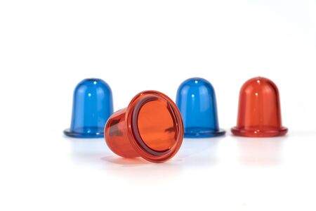 blue and red anti cellulite vacuum silicone banks for body on white background. a tool for home...