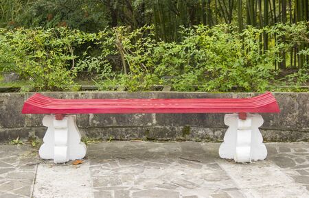 bench in the city Park is made in the Chinese style.
