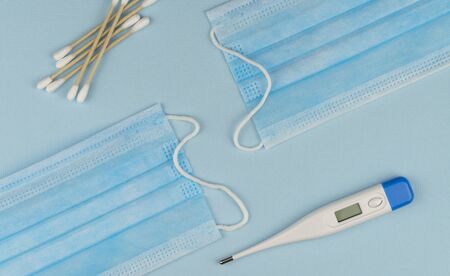 Coronavirus prevention surgical masks and hand sanitizer gel for hand hygiene spread protection....