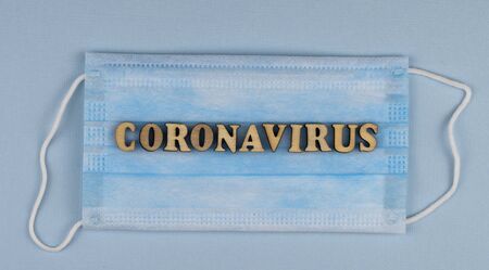 antiviral medical mask for protection against coronavirus. Surgical protective mask. Medical respiratory bandage face on white background. prevention of the spread of virusの写真素材