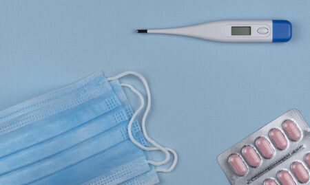 Coronavirus prevention surgical masks. Medical respiratory bandage face, electronic thermometer for...