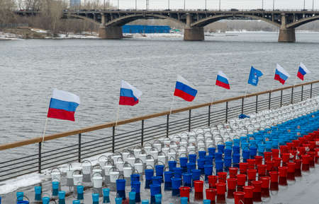 Russia, Krasnoyarsk, March 2020: many colorful plastic bucketsのeditorial素材