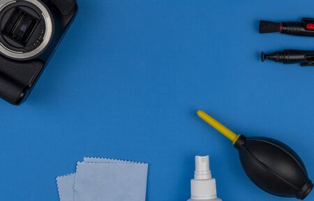 kit for cleaning photographic equipment and optics. Camera and lens care. photographer accessories, professional service. flat layout.の写真素材