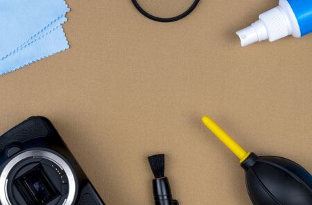 kit for cleaning photographic equipment and optics. Camera and lens care. photographer accessories, professional service. flat layout.の写真素材