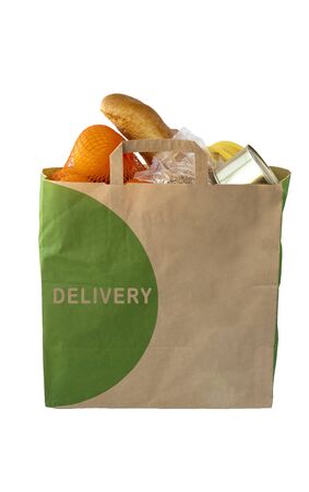 foodstuff in a paper bag on a white background. delivery foodの写真素材