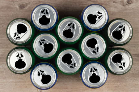 unusual Halloween mask. beer cans with masks of fear and horror. creative background. celebrate Halloween holiday.の写真素材