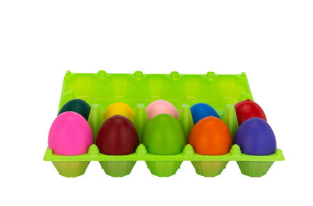 colorful eggs in box. plastic package. white background for easter concepts with space for text.の写真素材