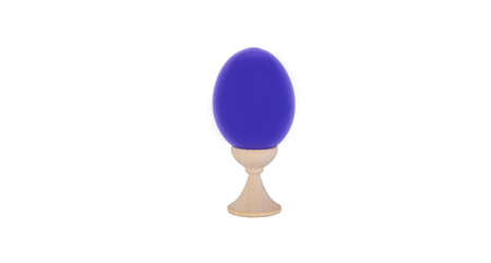 blue easter egg on a wooden stand, white background. attribute of the celebration of the oldest Christian holiday of Easter. set of bright bollocksの写真素材