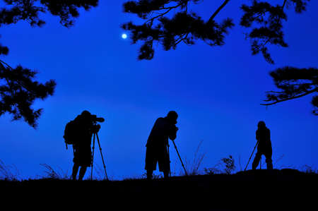 The photographer capture photo with tripod