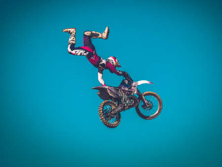 Motocross Driver Jumping with blue Sky Backgroundのeditorial素材