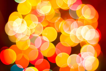 Abstract festive background with bokeh defocused lightsの写真素材