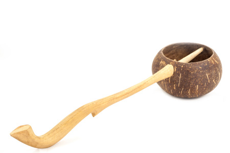 Dipper made from coconut shell, traditional container for drinking water of Thai people, isolated on white backgroundの写真素材