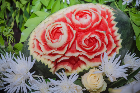 Fruit carvings on the buffet table.の写真素材