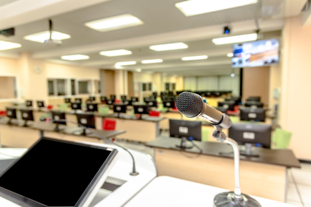 Microphone in the computer room for talker with defocused background, selective focus on microphoneの写真素材