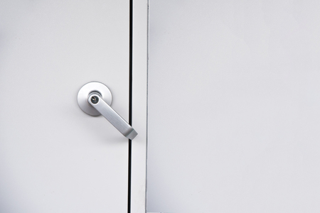 Exterior modern style door handle and security key lock on the doorの写真素材
