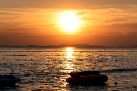 Golden hours , beautiful sunset above the sea.の写真素材