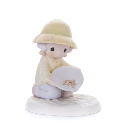 Ceramic doll on white background.の写真素材