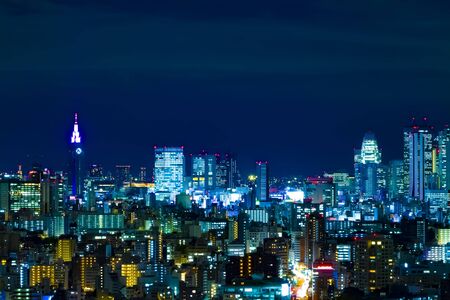 A night cityscape at the urban city in Tokyo wide shotの写真素材