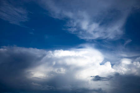A cloud in the blue sky wide shotの写真素材