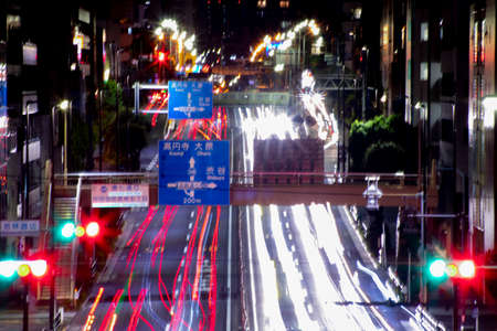 A night traffic jam at the urban street in Tokyo long shot