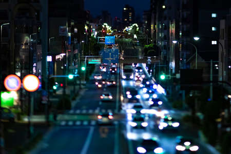 A night miniature traffic jam at the urban street in Tokyoの写真素材