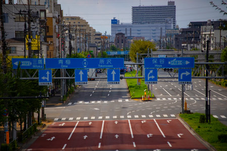 A empty urban street in Tokyo long shotの写真素材