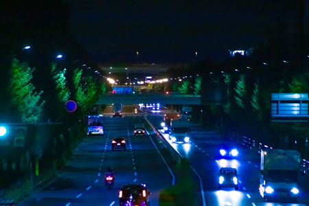 A night traffic jam at the downtown street in Takashimadaira Tokyo telephoto