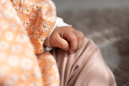 Childs hands in the living room closeupの写真素材