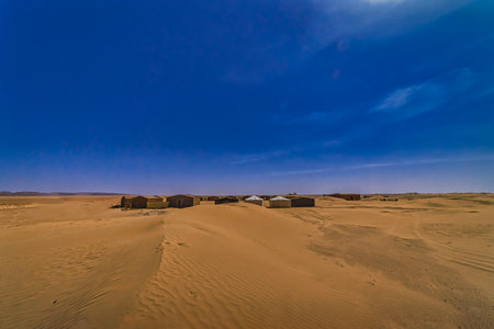 A panoramic sand dune near the desert camp at Mhamid el Ghizlane in Morocco wideの写真素材